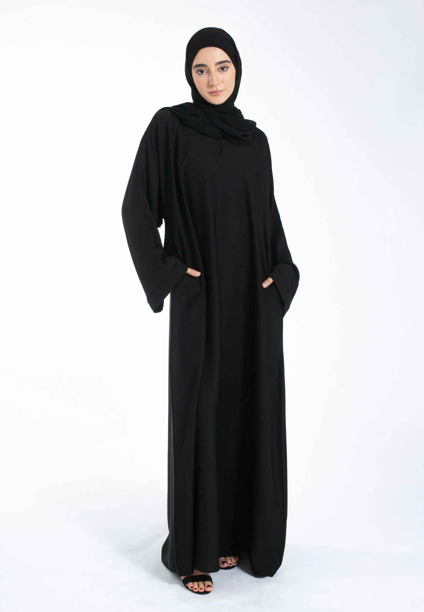 Black Textured Abaya With Zip Pockets - Hayah Al-Muslimah