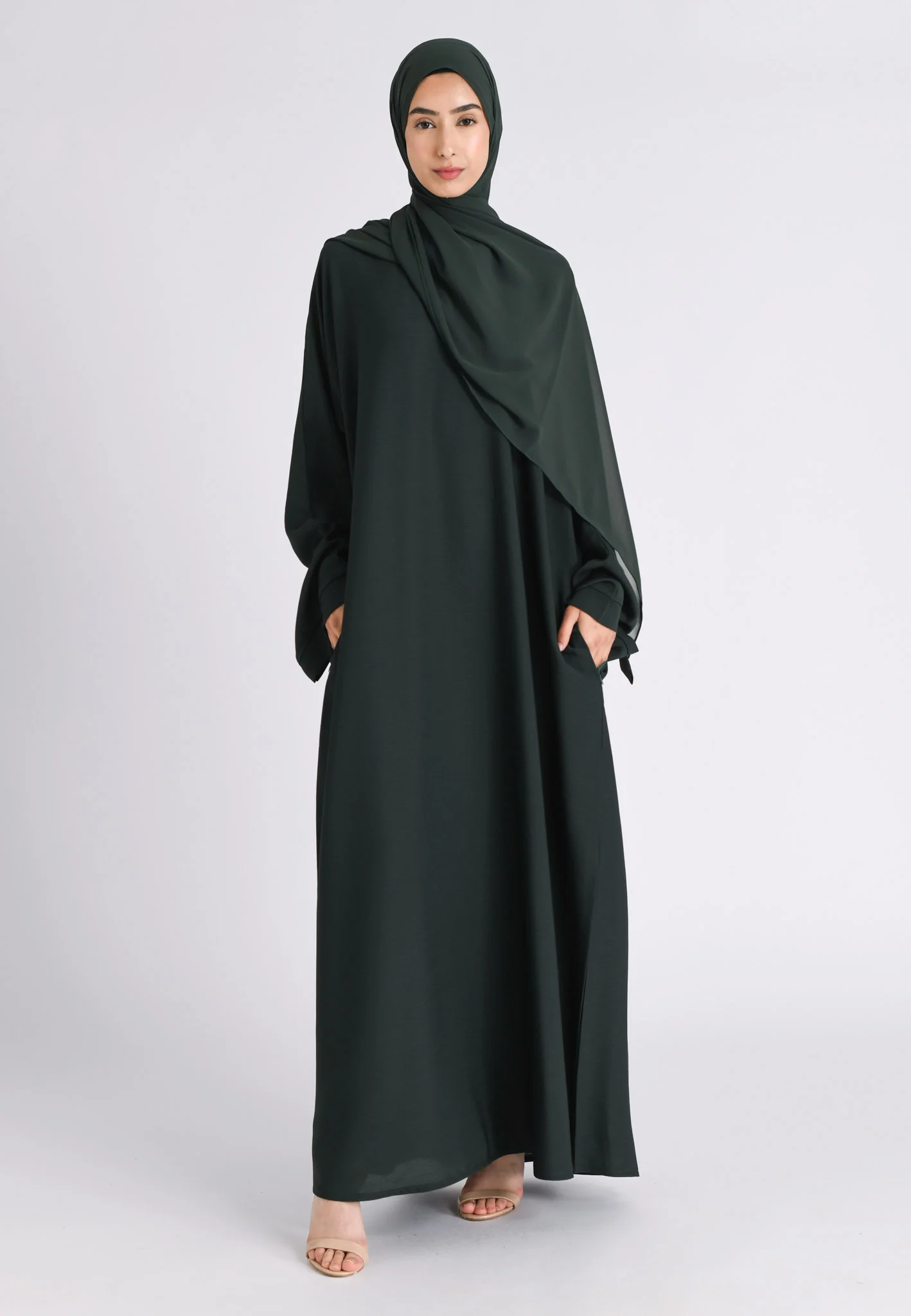 Bottle Green Textured Abaya With Zip Pockets (Premium) - Hayah Al-Muslimah